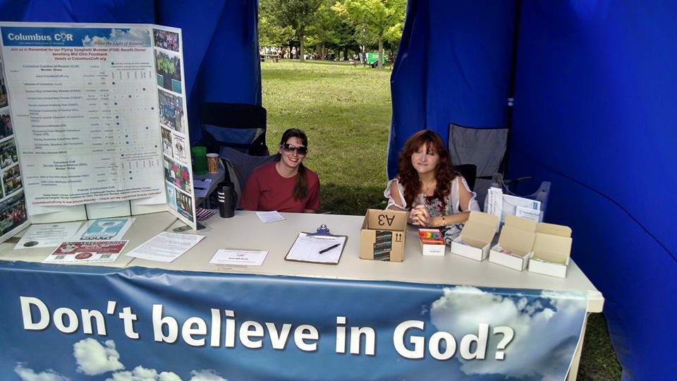 Summer events: Amy and Mandi tabling at Columbus CoR booth in 2015